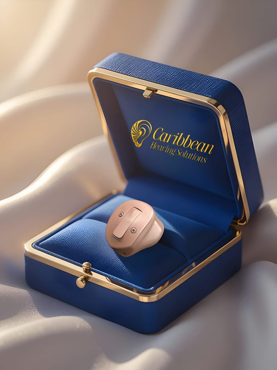 In-the-ear hearing aid resting in a blue velvet ring box